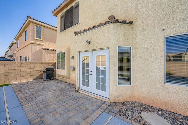 10428 Mulvaney Cir, Las Vegas, NV 89141 - view of patio / terrace with french doors and area for grilling