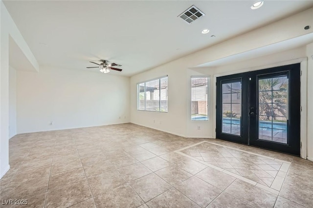 10428 Mulvaney Cir, Las Vegas, NV 89141 - foyer entrance featuring french doors, ceiling fan, light tile patterned flooring, and recessed lighting