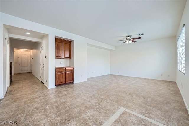 10428 Mulvaney Cir, Las Vegas, NV 89141 - unfurnished living room with ceiling fan and recessed lighting