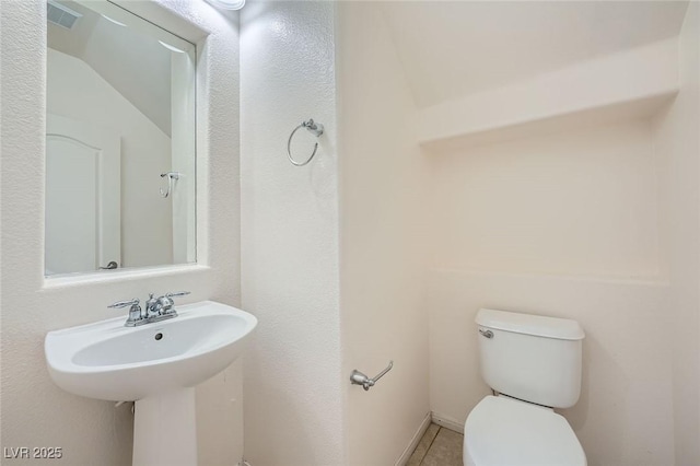 10428 Mulvaney Cir, Las Vegas, NV 89141 - bathroom featuring toilet and tile patterned floors