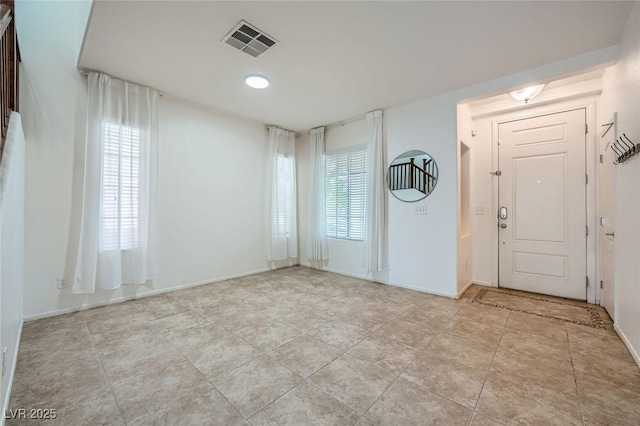10428 Mulvaney Cir, Las Vegas, NV 89141 - foyer entrance with healthy amount of natural light and light tile patterned floors