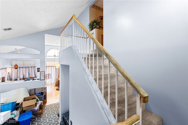 5539 Foxtail Ridge St, North Las Vegas, NV 89031 - staircase featuring high vaulted ceiling