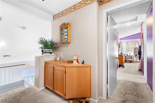 5539 Foxtail Ridge St, North Las Vegas, NV 89031 - corridor with light colored carpet and attic access