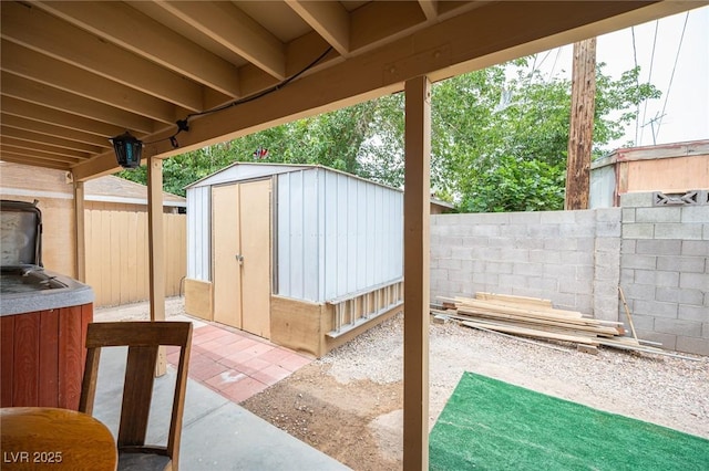 4616 E Idaho Ave, Las Vegas, NV 89104 - fenced backyard with a shed and a patio area