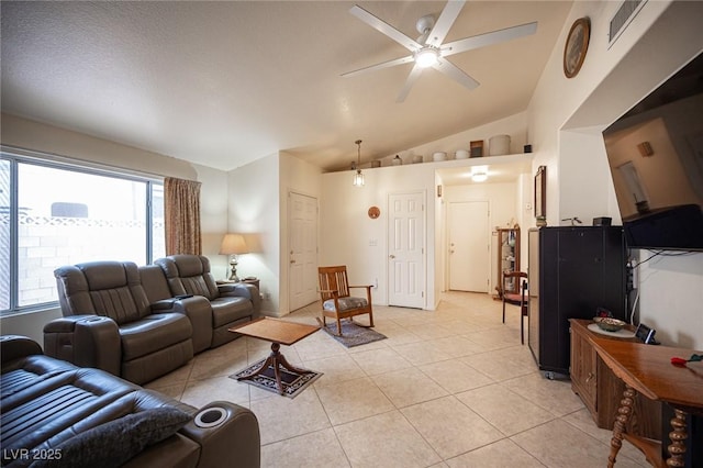 4616 E Idaho Ave, Las Vegas, NV 89104 - living area with a ceiling fan, vaulted ceiling, and light tile patterned floors