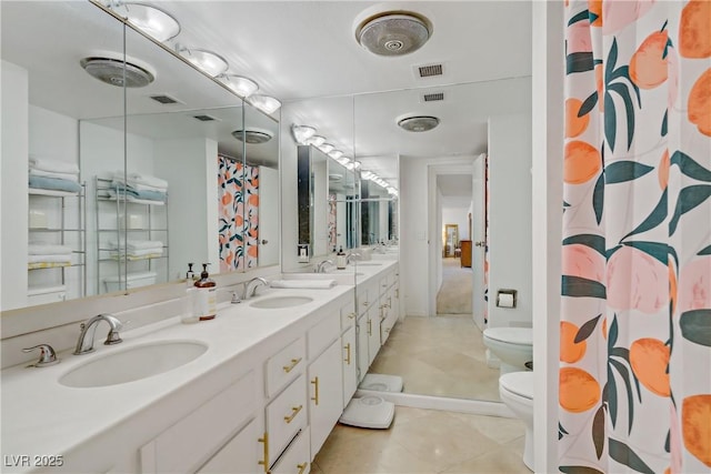 205 E Harmon Ave Unit 306, Las Vegas, NV 89169 - bathroom featuring double vanity, tile patterned flooring, and curtained shower