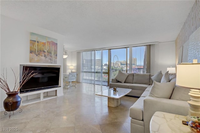 205 E Harmon Ave Unit 306, Las Vegas, NV 89169 - living area with expansive windows and a fireplace