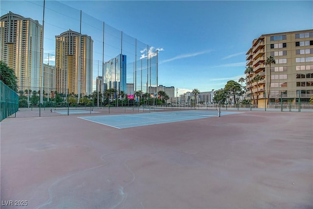 205 E Harmon Ave Unit 306, Las Vegas, NV 89169 - view of tennis court with a view of skyline