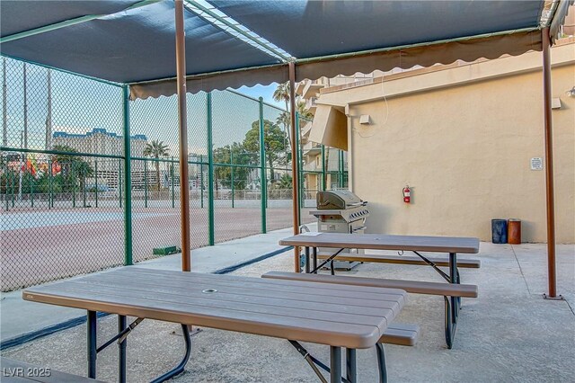 205 E Harmon Ave Unit 306, Las Vegas, NV 89169 - view of patio / terrace with area for grilling and a tennis court