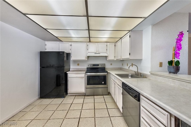 3930 University Center Dr Unit 412, Las Vegas, NV 89119 - kitchen with appliances with stainless steel finishes, under cabinet range hood, white cabinets, and light countertops