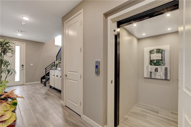 4336 Guava Ct Unit 0, Las Vegas, NV 89135 - hall featuring light wood finished floors, elevator, stairs, and recessed lighting