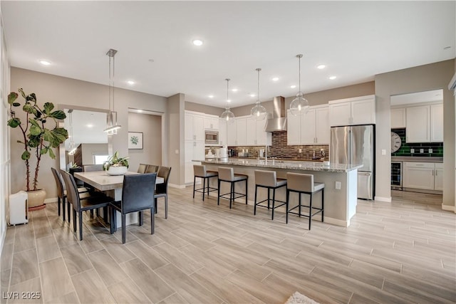 4336 Guava Ct Unit 0, Las Vegas, NV 89135 - dining room with wine cooler, light wood-type flooring, and recessed lighting