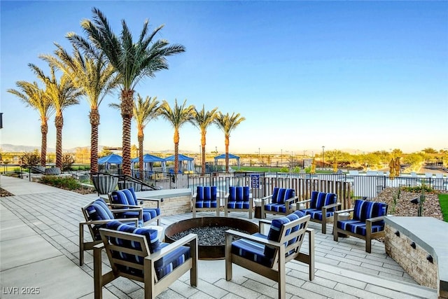 4336 Guava Ct Unit 0, Las Vegas, NV 89135 - patio terrace at dusk with a patio area and an outdoor living space with a fire pit