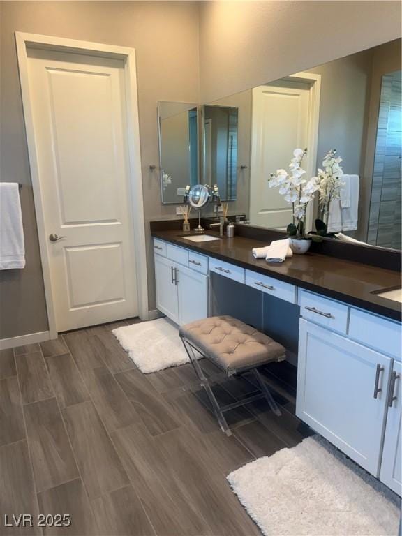 4336 Guava Ct, Las Vegas, NV 89135 - bathroom with wood finished floors and double vanity