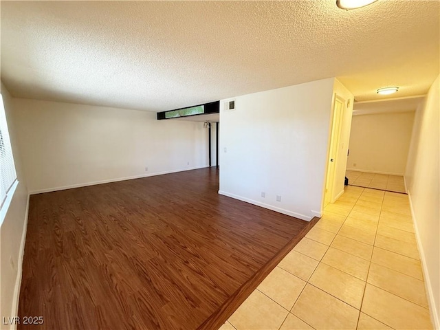 3270 Liahona Way, Las Vegas, NV 89121 - empty room featuring a textured ceiling and light wood-type flooring
