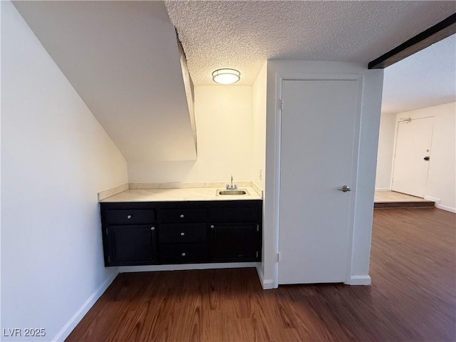 3270 Liahona Way, Las Vegas, NV 89121 - bathroom with wood finished floors, a textured ceiling, and vanity