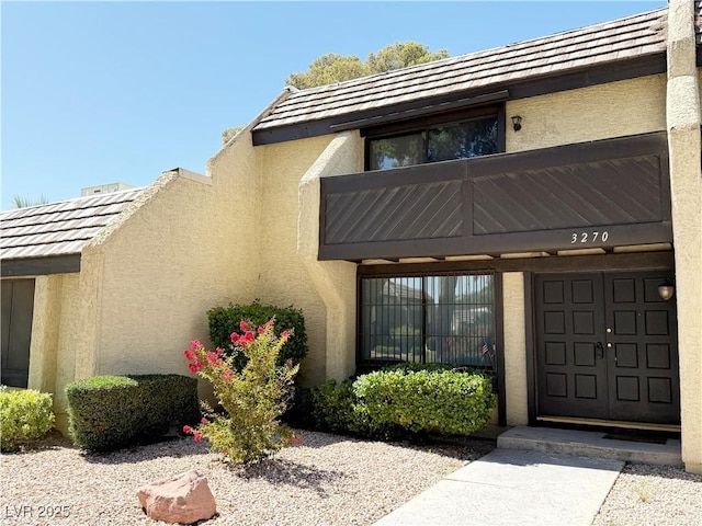 3270 Liahona Way, Las Vegas, NV 89121 - property entrance with stucco siding