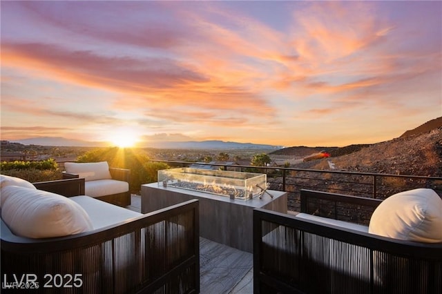 387 Solitude Peak Ln, Henderson, NV 89012 - wooden terrace featuring a mountain view and a fire pit