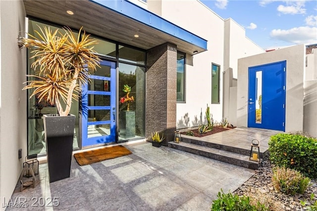 387 Solitude Peak Ln, Henderson, NV 89012 - view of exterior entry with stucco siding