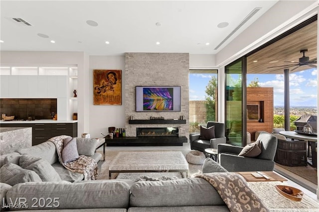 387 Solitude Peak Ln, Henderson, NV 89012 - living area with a fireplace, recessed lighting, and ceiling fan