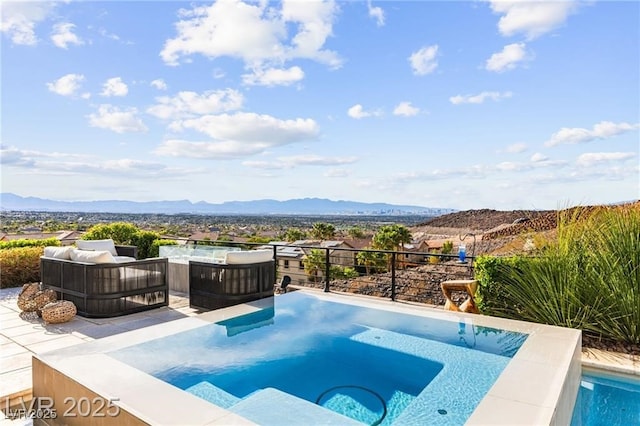 387 Solitude Peak Ln, Henderson, NV 89012 - view of swimming pool featuring a jacuzzi and a mountain view