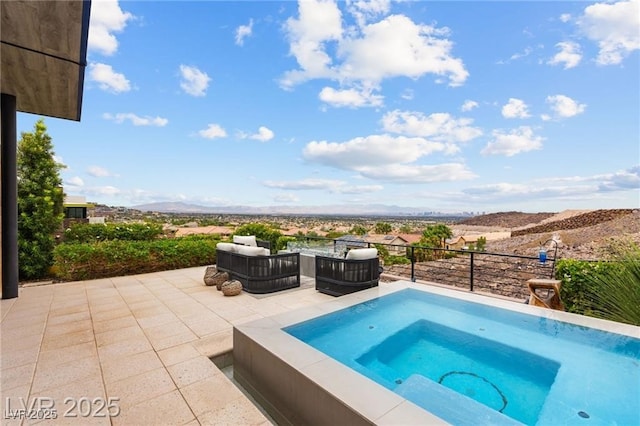387 Solitude Peak Ln, Henderson, NV 89012 - view of swimming pool featuring a mountain view, an in-ground hot tub, and a patio