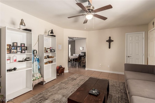 4168 Wendy Ln, Las Vegas, NV 89115 - living area featuring tile patterned floors and a ceiling fan