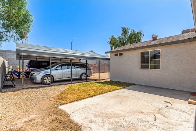 4168 Wendy Ln, Las Vegas, NV 89115 - view of parking featuring a carport