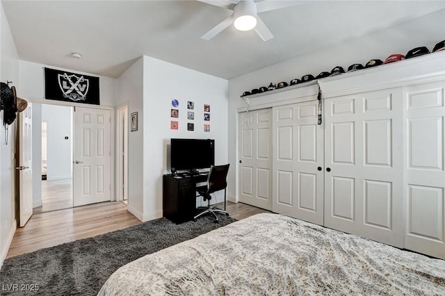 2496 Ram Crossing Way, Henderson, NV 89074 - bedroom with wood finished floors, an office area, and a ceiling fan