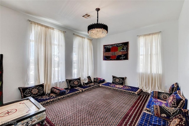 2496 Ram Crossing Way, Henderson, NV 89074 - bedroom featuring a chandelier