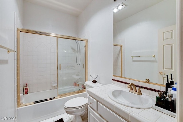 2496 Ram Crossing Way, Henderson, NV 89074 - bathroom with vanity and combined bath / shower with glass door