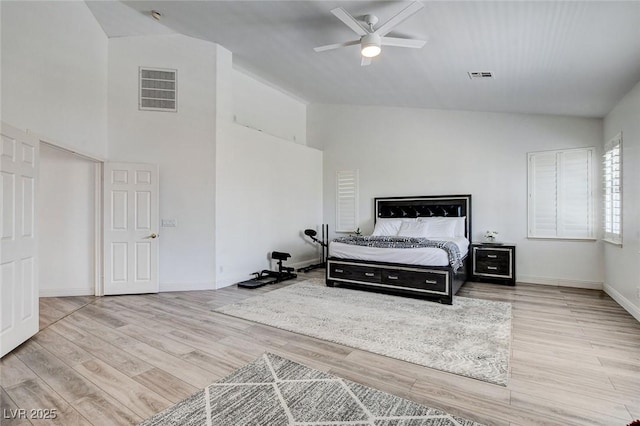 2496 Ram Crossing Way, Henderson, NV 89074 - bedroom featuring high vaulted ceiling, wood finished floors, and ceiling fan