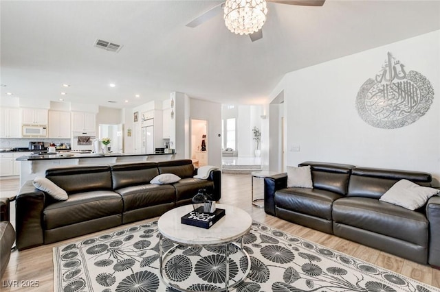 2496 Ram Crossing Way, Henderson, NV 89074 - living room with a ceiling fan, light wood-style flooring, and recessed lighting