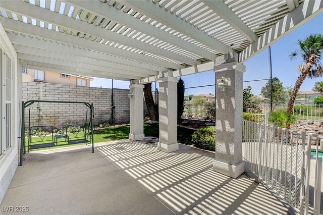 2496 Ram Crossing Way, Henderson, NV 89074 - fenced backyard with a pergola and a patio area