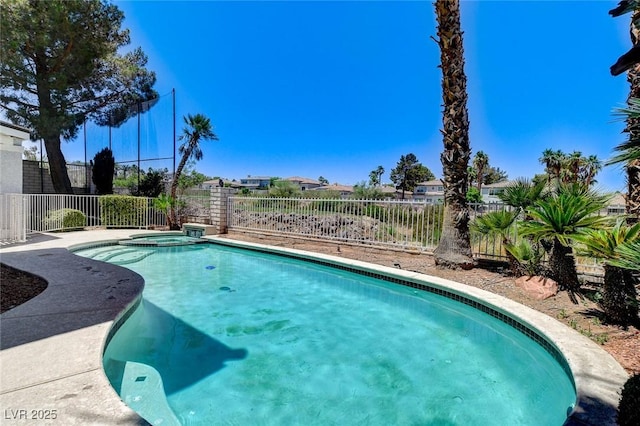 2496 Ram Crossing Way, Henderson, NV 89074 - view of pool with a fenced backyard and a pool with connected hot tub