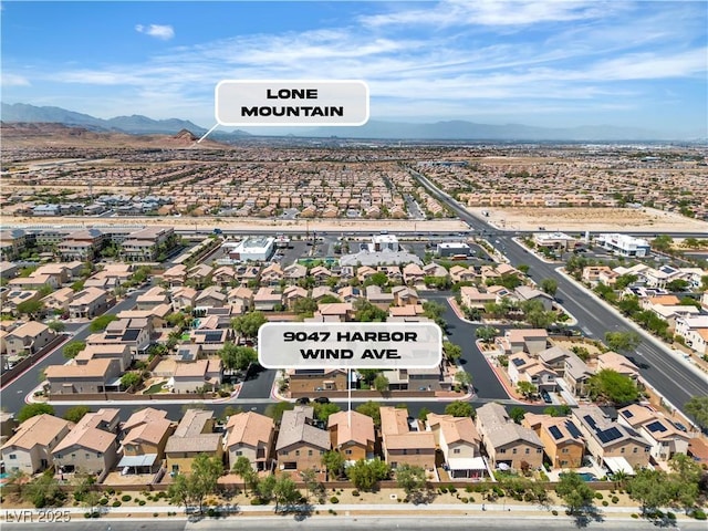 9047 Harbor Wind Ave, Las Vegas, NV 89178 - aerial view of residential area featuring a mountainous background