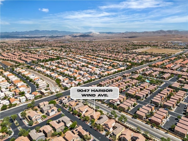 9047 Harbor Wind Ave, Las Vegas, NV 89178 - aerial view of property's location featuring nearby suburban area and a mountain backdrop