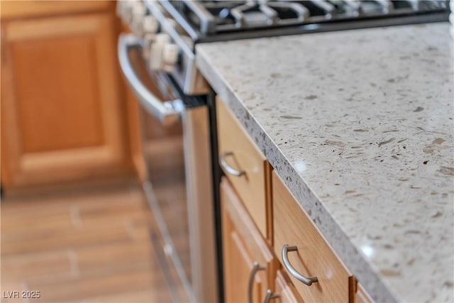 9047 Harbor Wind Ave, Las Vegas, NV 89178 - kitchen view of stainless steel gas range and light countertops