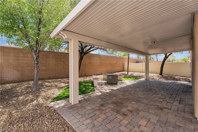 9047 Harbor Wind Ave, Las Vegas, NV 89178 - fenced backyard with a patio area