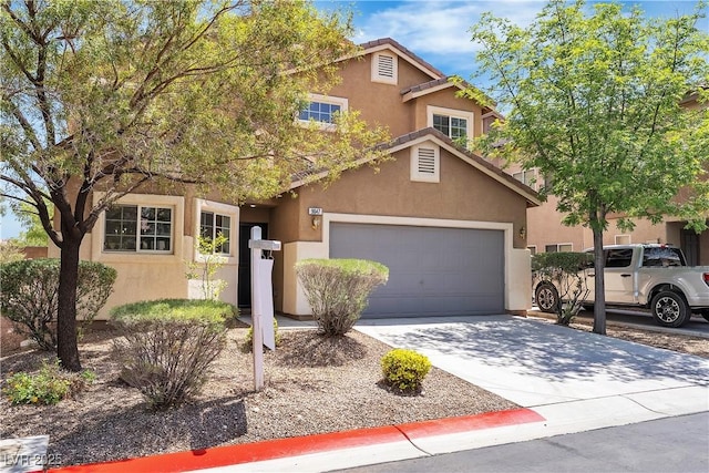 9047 Harbor Wind Ave, Las Vegas, NV 89178 - view of front of house with stucco siding, a garage, and concrete driveway