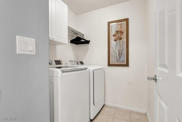 9408 Ironsend St, Las Vegas, NV 89143 - laundry area with separate washer and dryer, cabinet space, and light tile patterned floors