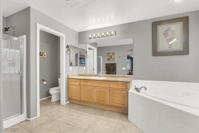 9408 Ironsend St, Las Vegas, NV 89143 - bathroom featuring vanity, a shower stall, tile patterned flooring, and a bath