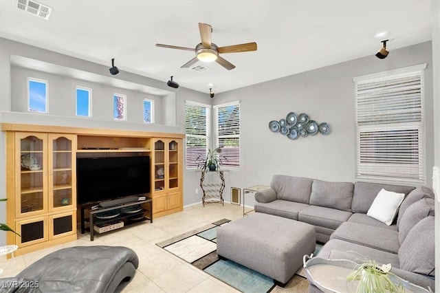9408 Ironsend St, Las Vegas, NV 89143 - living room with ceiling fan and light tile patterned flooring