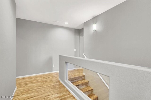 9408 Ironsend St, Las Vegas, NV 89143 - staircase featuring wood finished floors and baseboards