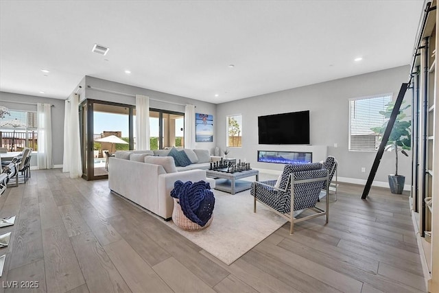 112 Springbough Ln, Las Vegas, NV 89138 - living room with healthy amount of natural light, wood finished floors, and recessed lighting