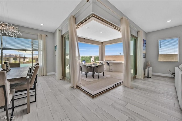 112 Springbough Ln, Las Vegas, NV 89138 - dining area with wood finished floors, plenty of natural light, a chandelier, and recessed lighting