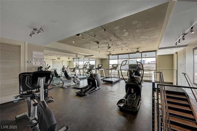 353 E Bonneville Ave Unit 449, Las Vegas, NV 89101 - gym with rail lighting and a wall of windows