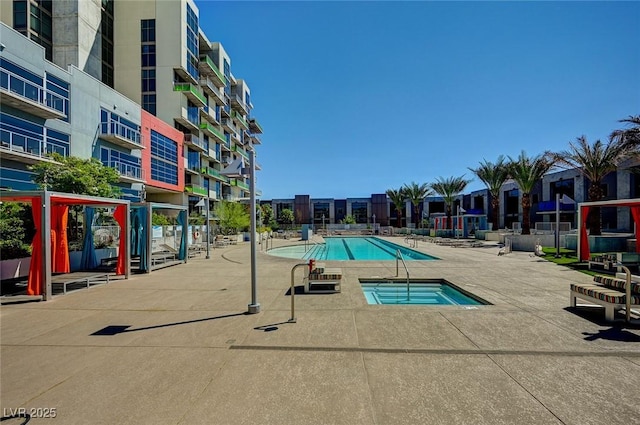 353 E Bonneville Ave Unit 449, Las Vegas, NV 89101 - community pool with a patio and a hot tub