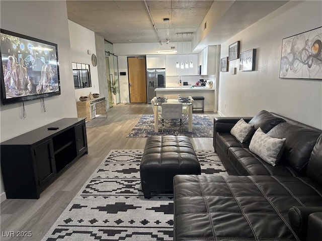 353 E Bonneville Ave Unit 449, Las Vegas, NV 89101 - living room with light wood-style flooring