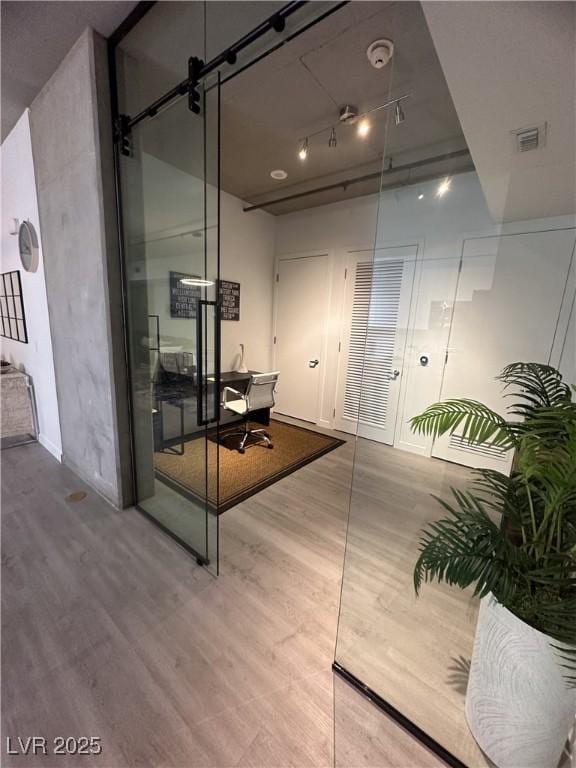353 E Bonneville Ave Unit 449, Las Vegas, NV 89101 - hall featuring wood finished floors